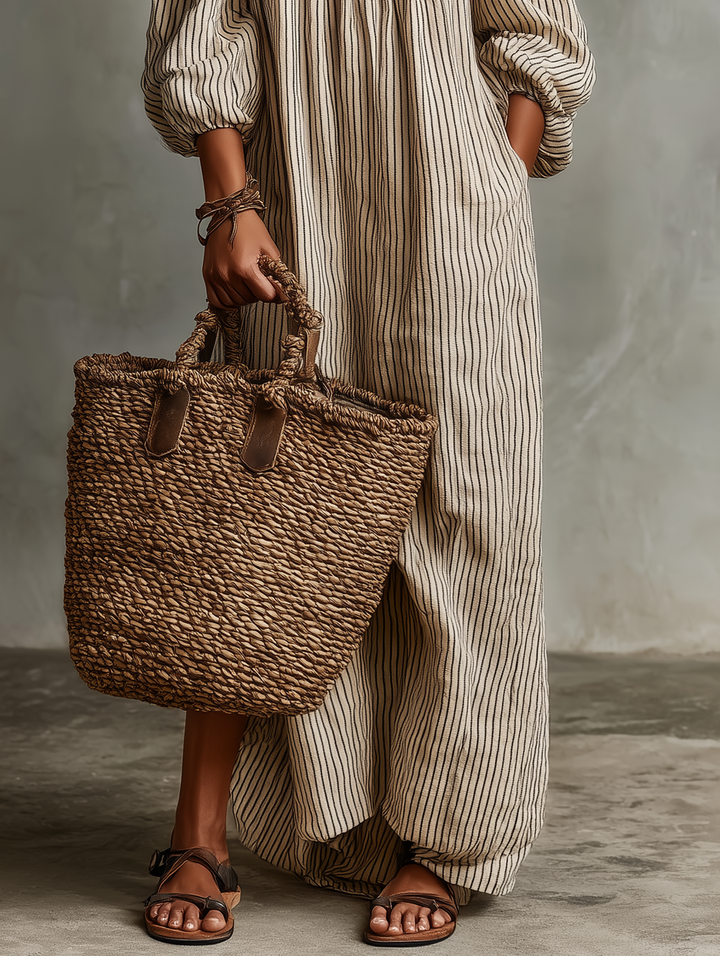 Stylish women's long sleeve off-shoulder maxi dress, a versatile elegant piece for vacation and spring fashion.