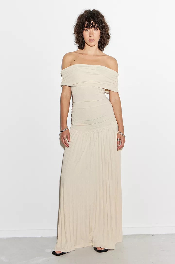 Pleated off-shoulder maxi wedding guest dress in a beautiful cream shade.