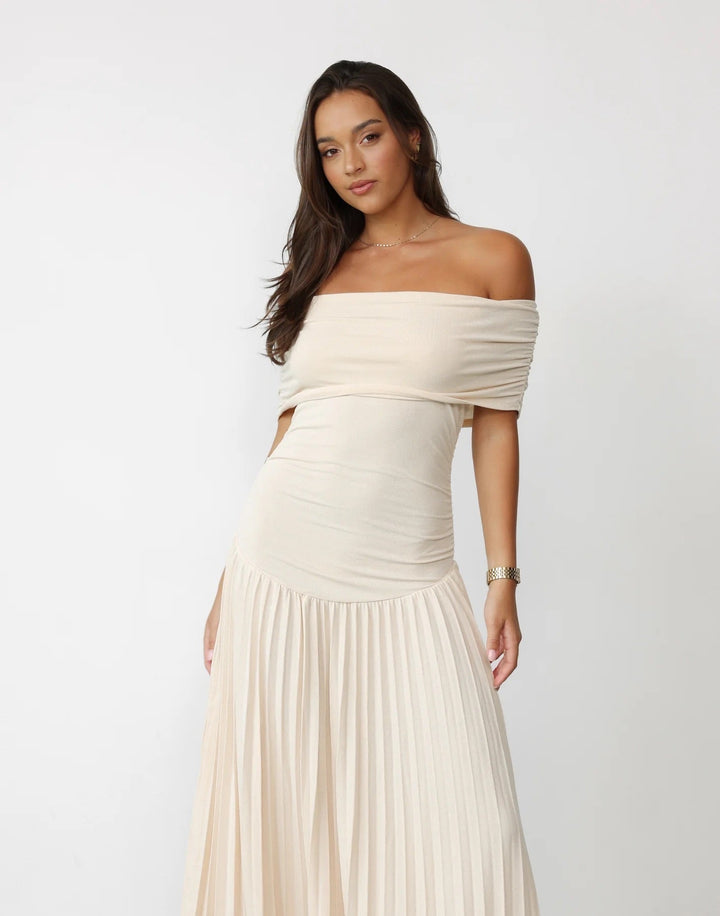 Navy off-shoulder pleated maxi dress, a chic choice for any special occasion.