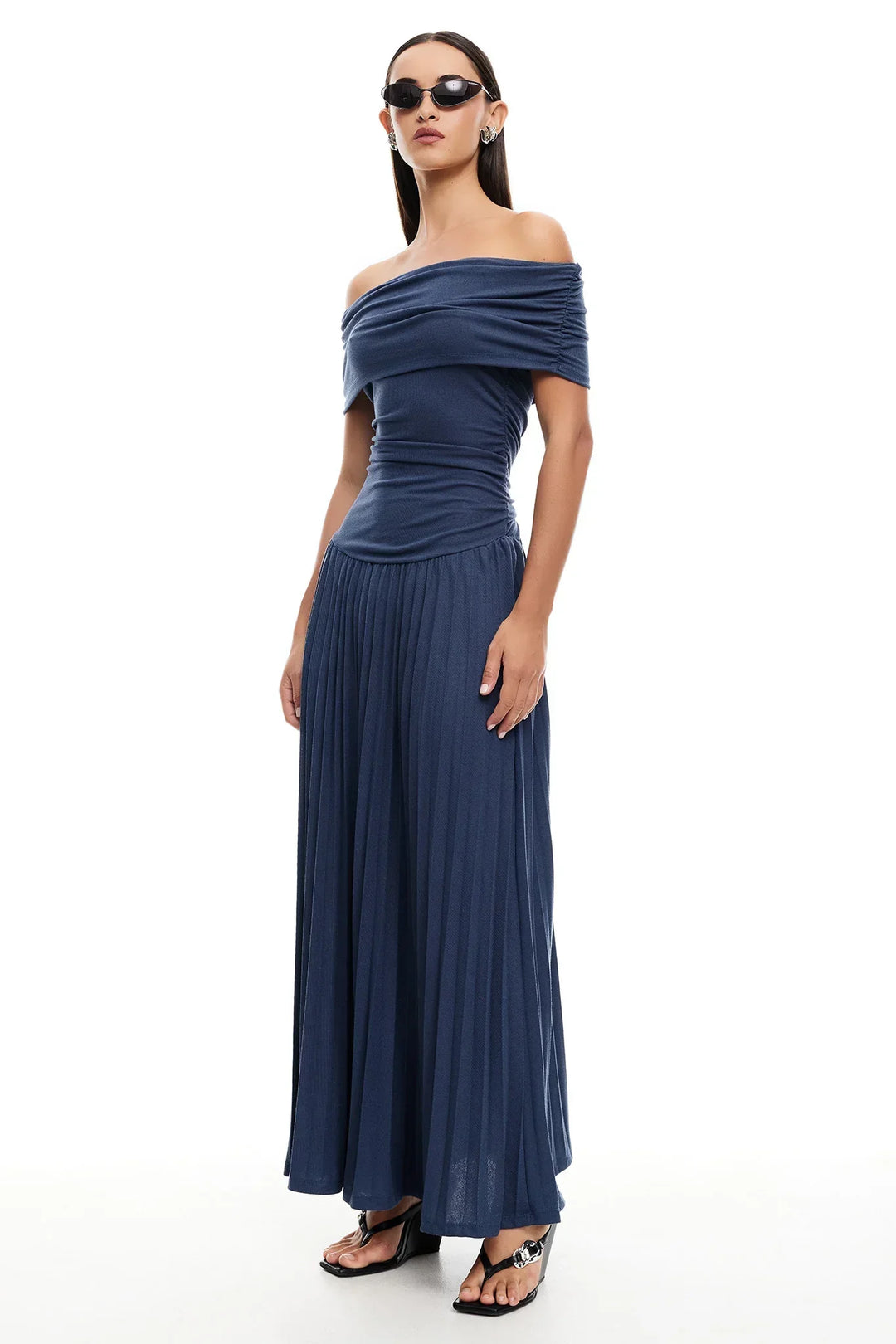 Pleated cream off-shoulder maxi dress, a beautiful option for formal occasions.