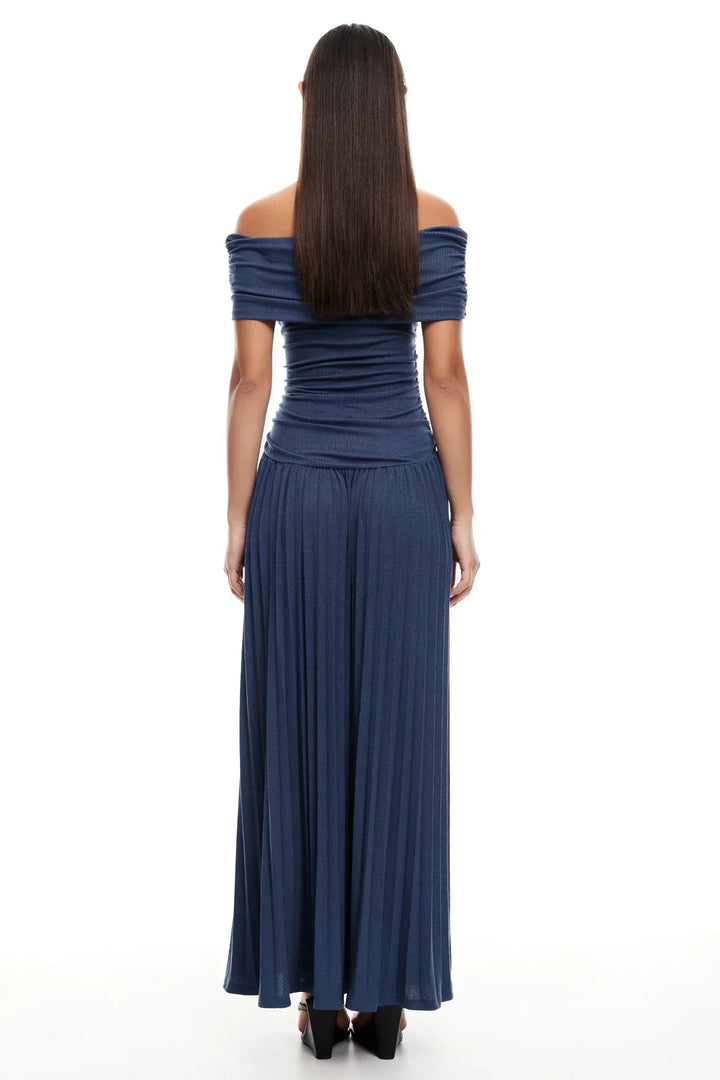 Women's blue off-shoulder pleated maxi dress, ideal for party wear.