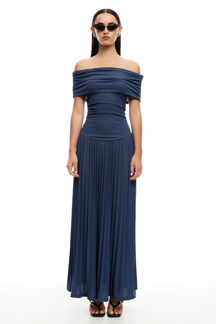 Chic navy off-shoulder pleated maxi dress, perfect for special event styling.