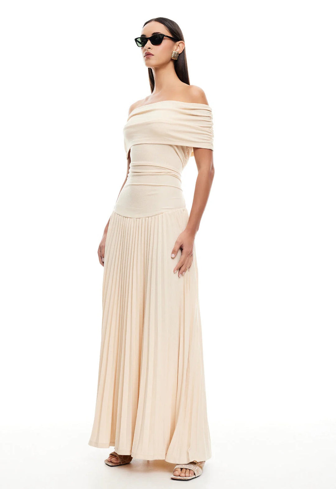 Chic cream off-shoulder pleated maxi dress, ideal for evening wear & parties.