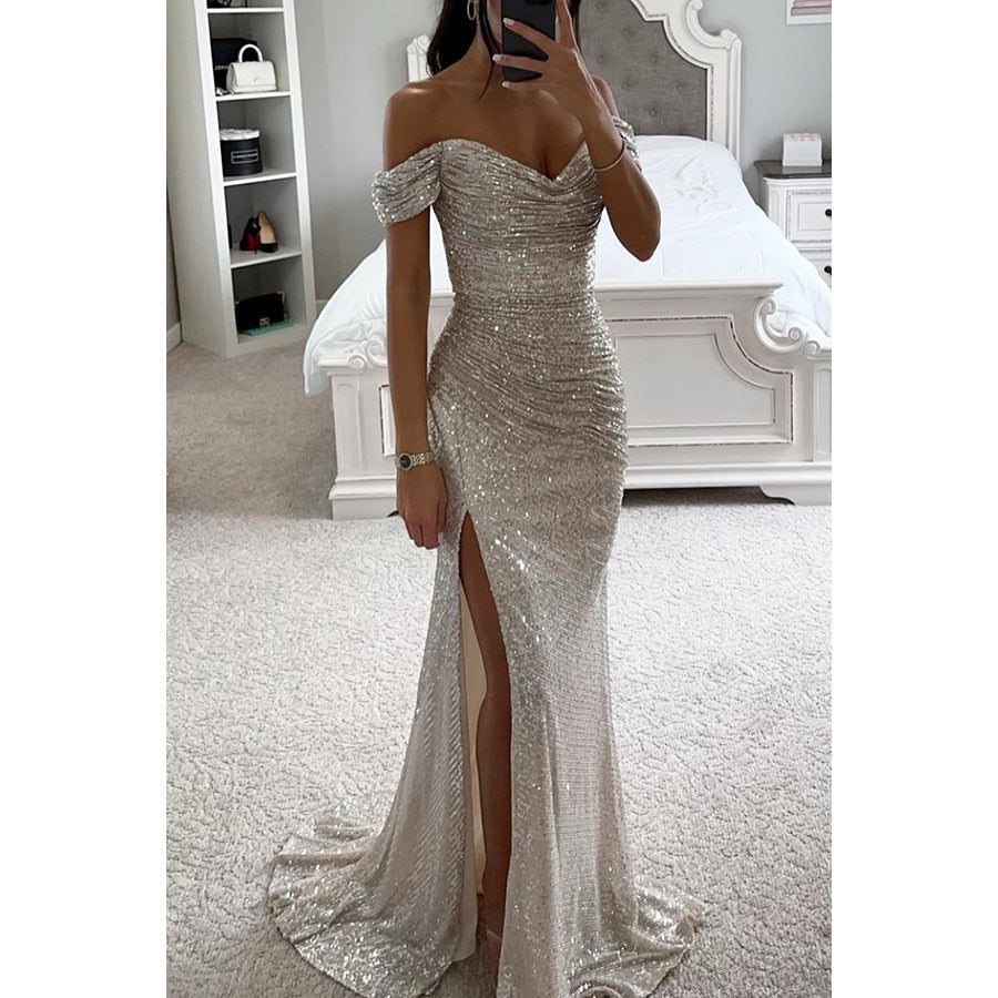 Full length view of a women's off-shoulder sequin evening gown, showcasing its high slit & elegant design.