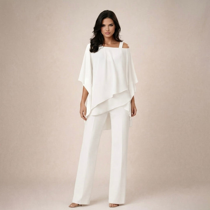Women's off-shoulder top & wide-leg pants matching set. Stylish two-piece summer outfit for elegant comfort.