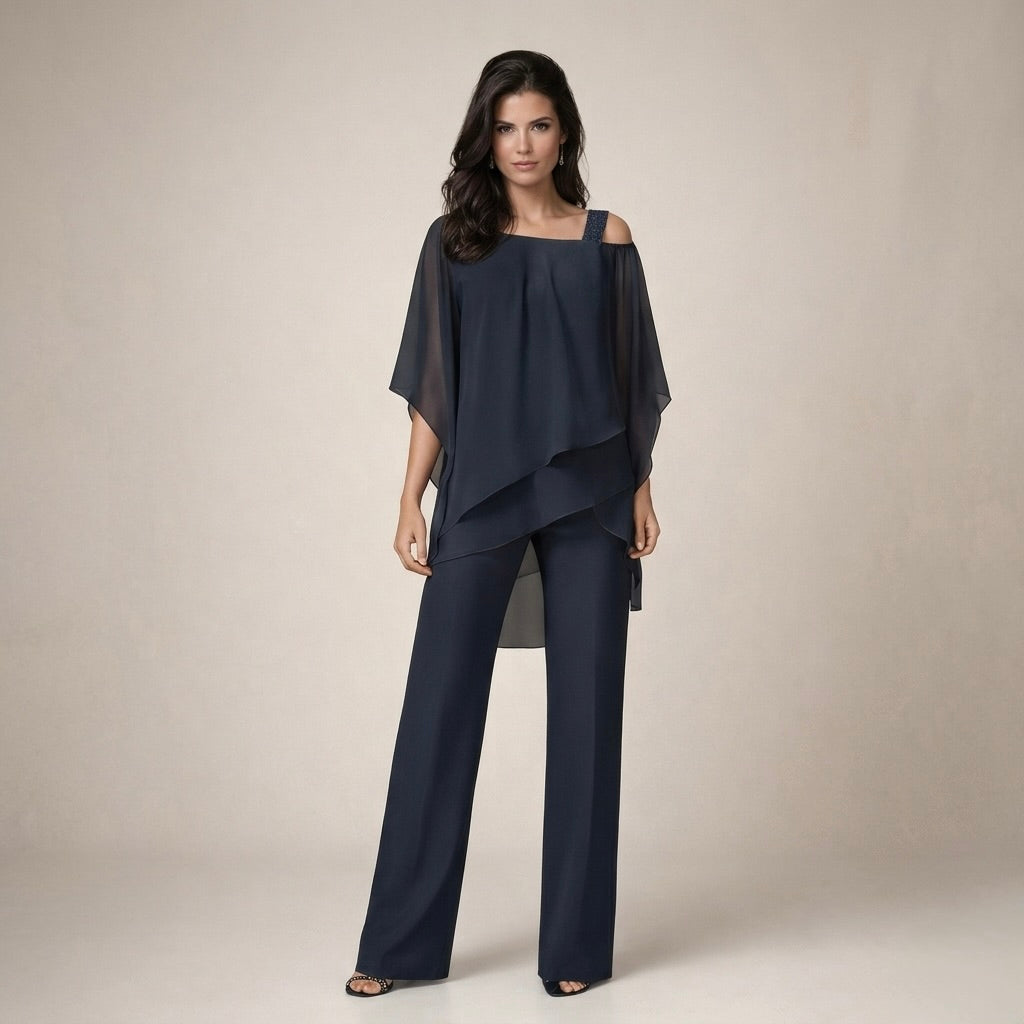 Fashionable women's off-shoulder top and wide-leg pants two-piece set. Perfect summer outfit for stylish comfort.