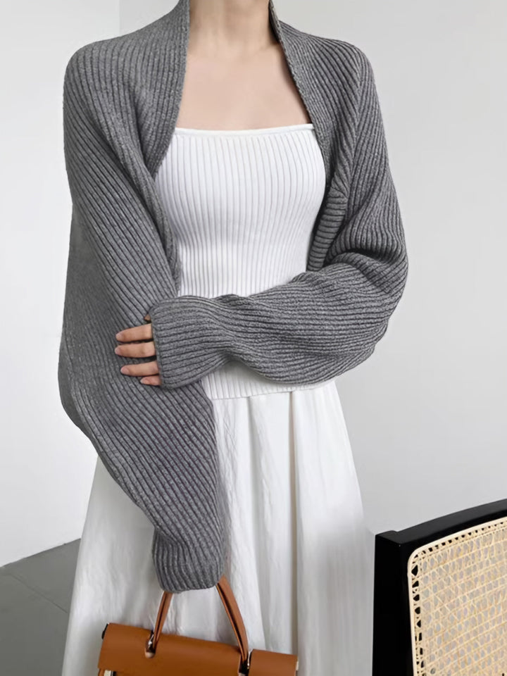 Women's fashionable shrug sweater, long sleeve open-front cardigan in a soft knit. Perfect layer.