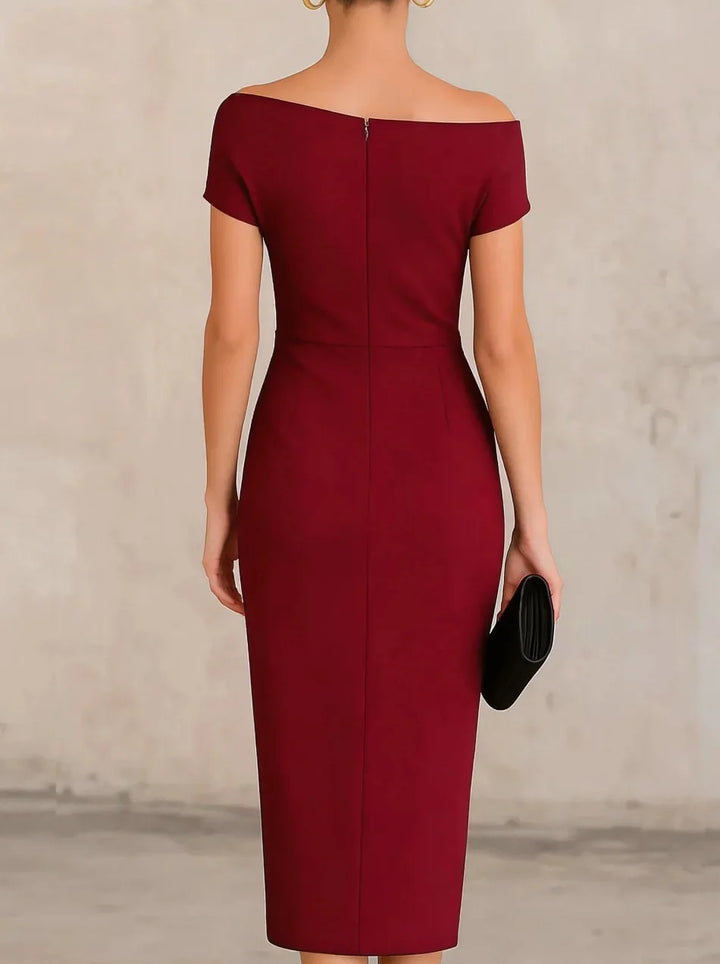 Stylish pleated midi dress for women with an elegant side slit, suitable for formal wear and special events.