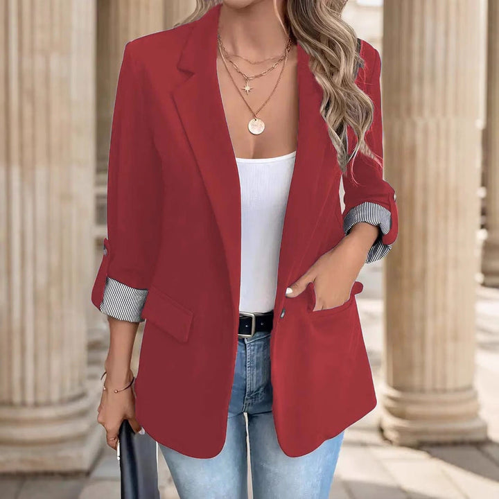 Versatile women's open front blazer. Notch lapel, striped cuff roll sleeves. Great for work or casual.