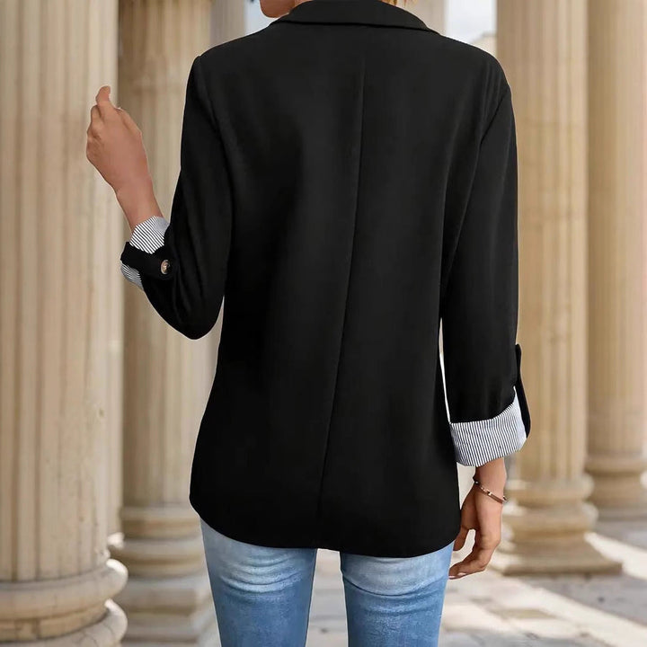 Elegant women's workwear blazer. Open front design, striped cuff roll sleeves & chic notch lapel.