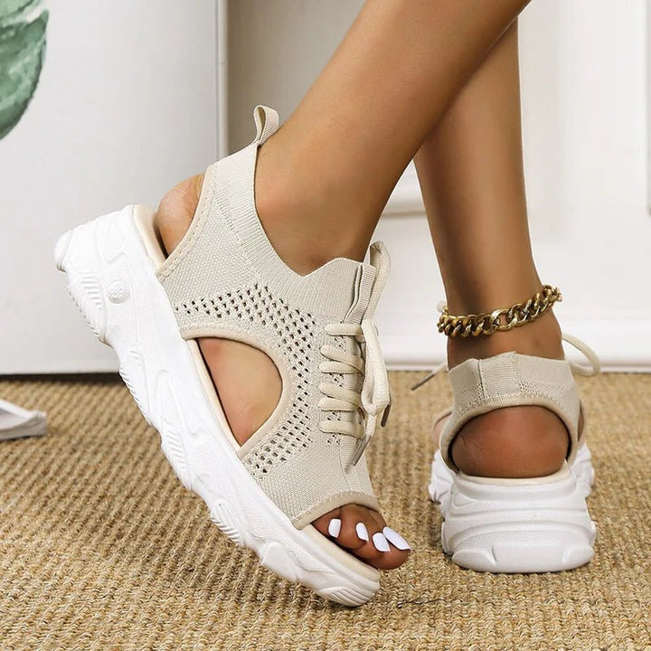 Summer-ready women's open-toe platform sandals. Featuring a chic lace-up design for style and ultimate comfort.