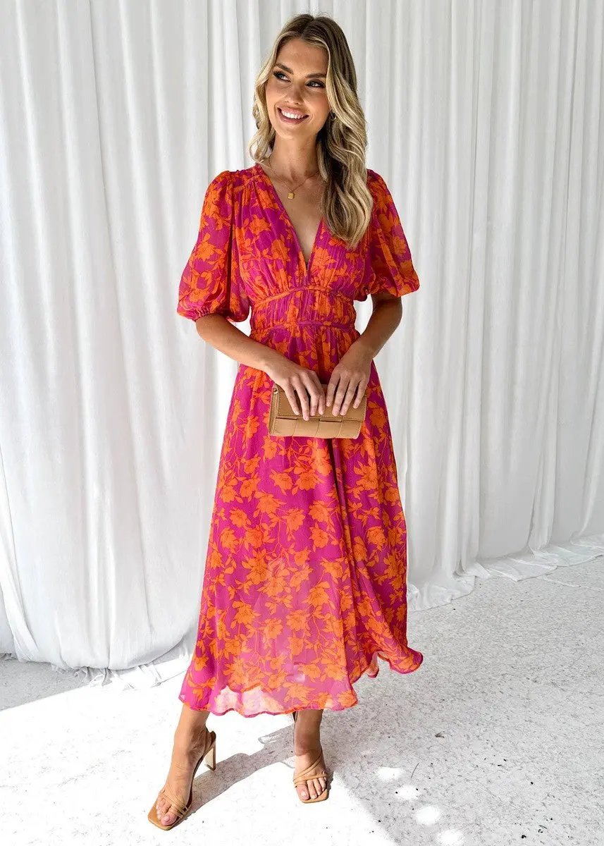Women's orange V-neck puff sleeve midi dress, perfect for a stylish summer or spring casual look.