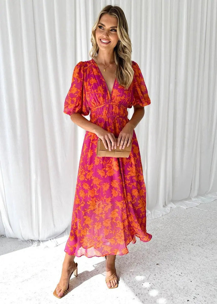 Women's orange V-neck puff sleeve midi dress, perfect for a stylish summer or spring casual look.