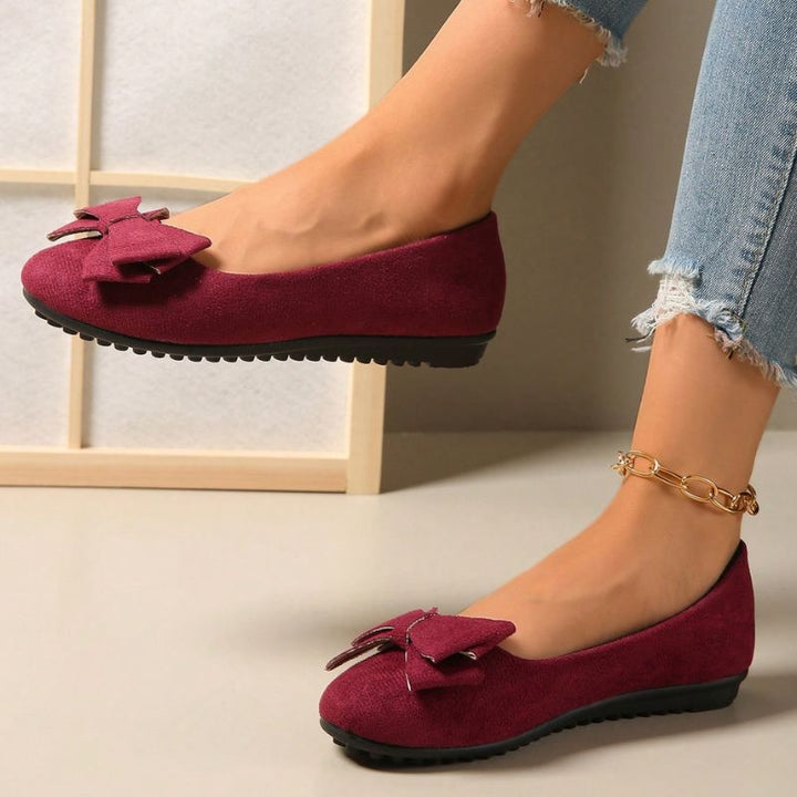 Women's wide fit comfort ballet flats with orthopaedic arch support & style.