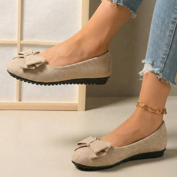 Women's wide fit dress flats, orthopaedic for all-day comfort & elegance.