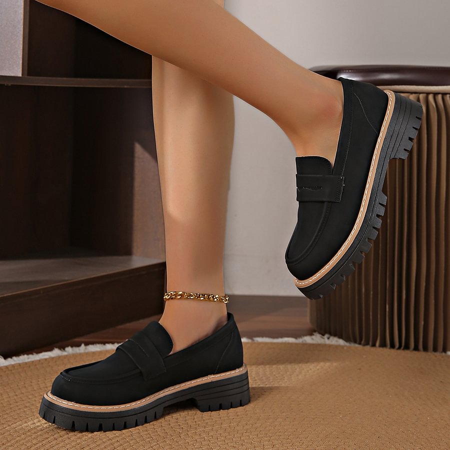 Foot-friendly black comfort loafers for women, offering a wide toe box & arch support.