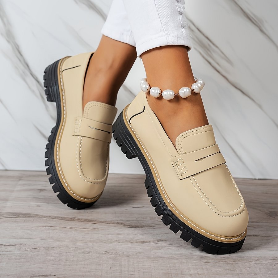 Slip-on women's casual loafers, featuring a wide toe box & orthopaedic support for foot health.