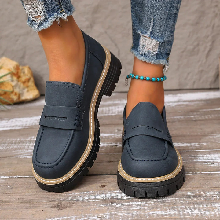 Stylish brown women's loafers with a wide toe box, ideal for casual everyday wear.