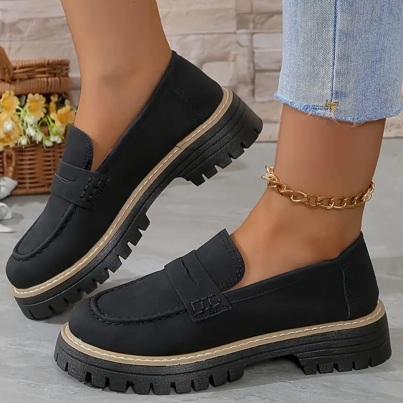 Grey supportive women's walking shoes, designed as slip-on loafers with wide toe box.