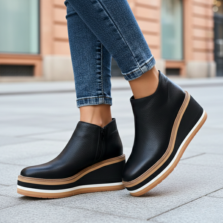 Fall fashion women's ankle boots with a comfortable wedge heel, ideal for orthopedic support & winter style.