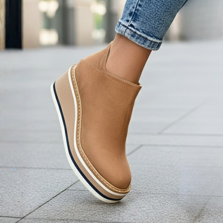 Easy-wear women's platform ankle boots with comfortable wedge heel, providing orthopedic support for long wear.