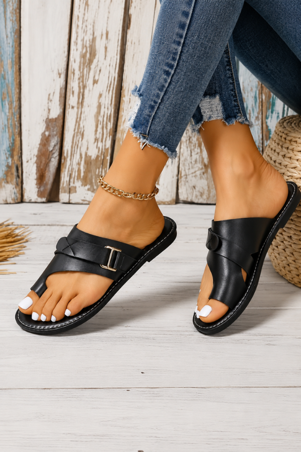 Adjustable women's bunion relief sandals. Orthopedic comfort footwear providing support for everyday wear.