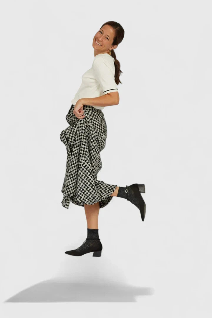 Stylish black women's orthopedic heels provide superior comfort and foot support for professional or dress occasions.