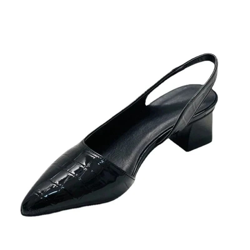 Elegant black women's pumps, orthopedic design, offering supportive comfort for dress, work, or versatile fashion.