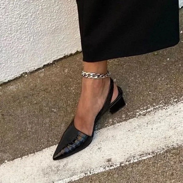 Supportive women's comfort pumps, black, featuring orthopedic foot support for all-day comfort in formal or work settings.