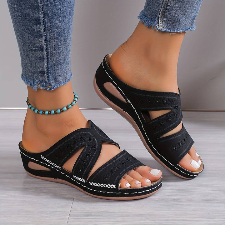 Cushioned women's walking sandals offering superior arch support and comfort footwear for summer.
