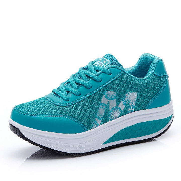 Orthopedic women's sneakers for pain relief. Posture-supporting walking shoes with breathable comfort.
