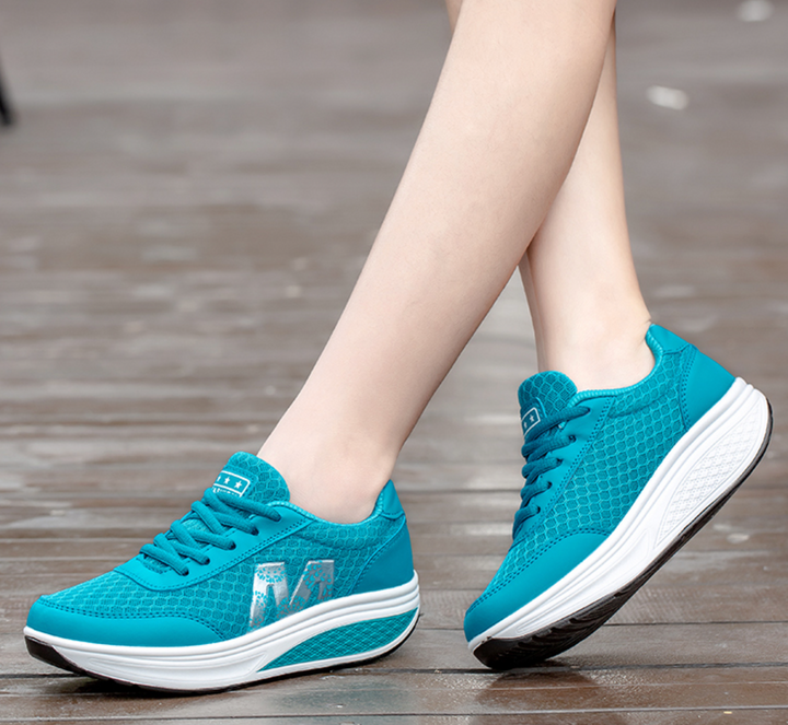 Athletic women's orthopedic shoes. Designed for walking with corrective support & all-day comfort.