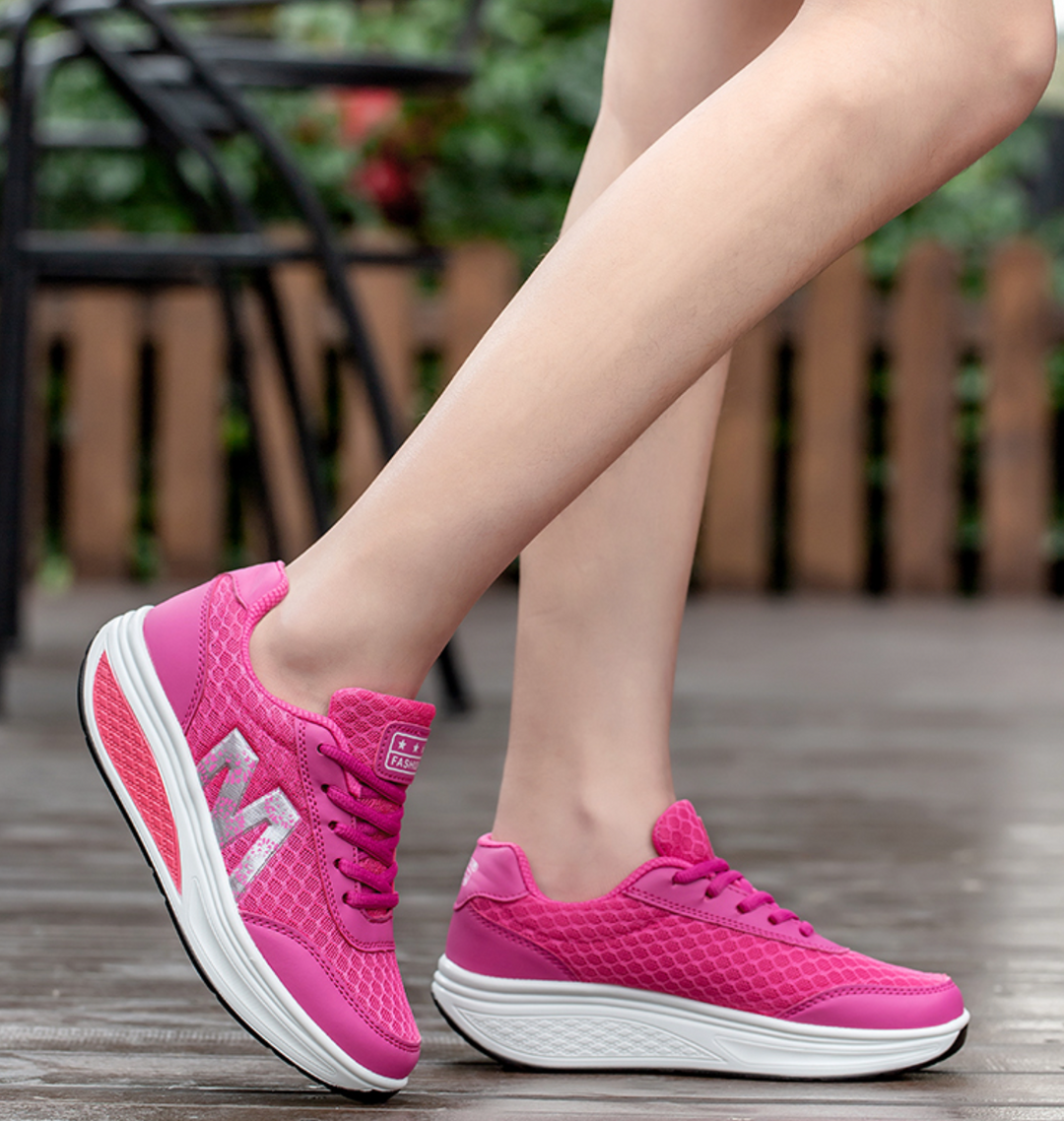 Women's supportive orthopedic walking shoes. Breathable sneakers with corrective features for active lifestyles.