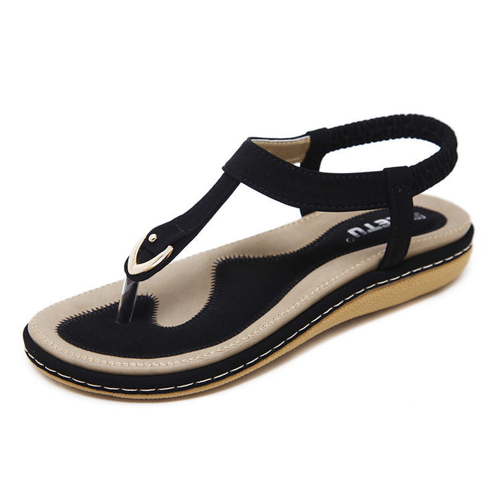 Comfortable women's flat sandals, designed with orthopedic arch support for casual summer walking.