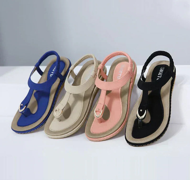 Summer women's flat sandals offering orthopedic arch support for all-day comfort. Perfect for casual walking.