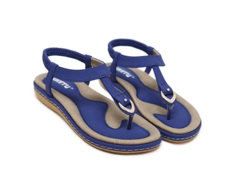Women's comfortable flat sandals with orthopedic arch support, suitable for walking and daily casual footwear.