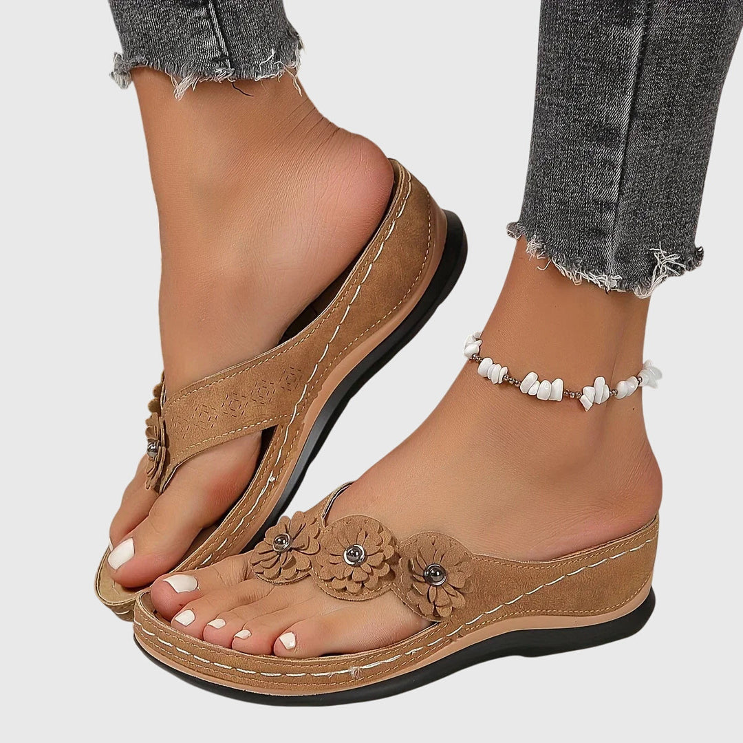 Orthopedic women's flip flops, providing arch support and all-day comfort for summer activities.