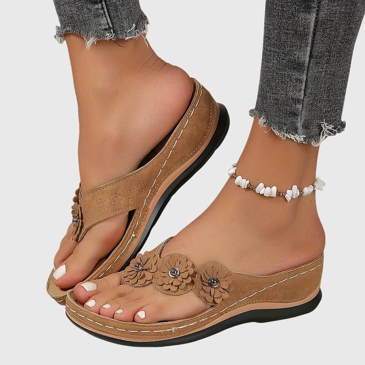 Orthopedic women's flip flops, providing arch support and all-day comfort for summer activities.