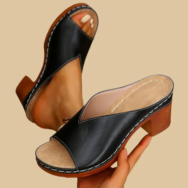 Comfortable women's heeled sandals featuring arch support & block heel. Enjoy all-day walking comfort.