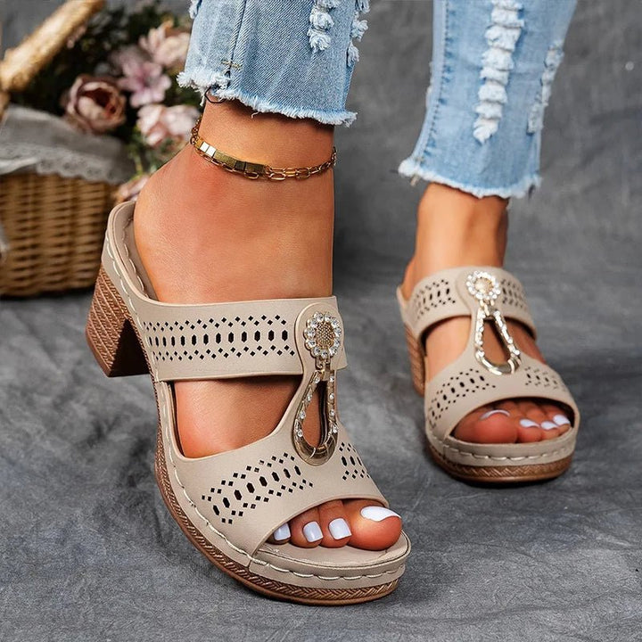 Supportive women's heeled orthopedic sandals providing comfort & relief, perfect for elegant summer footwear.