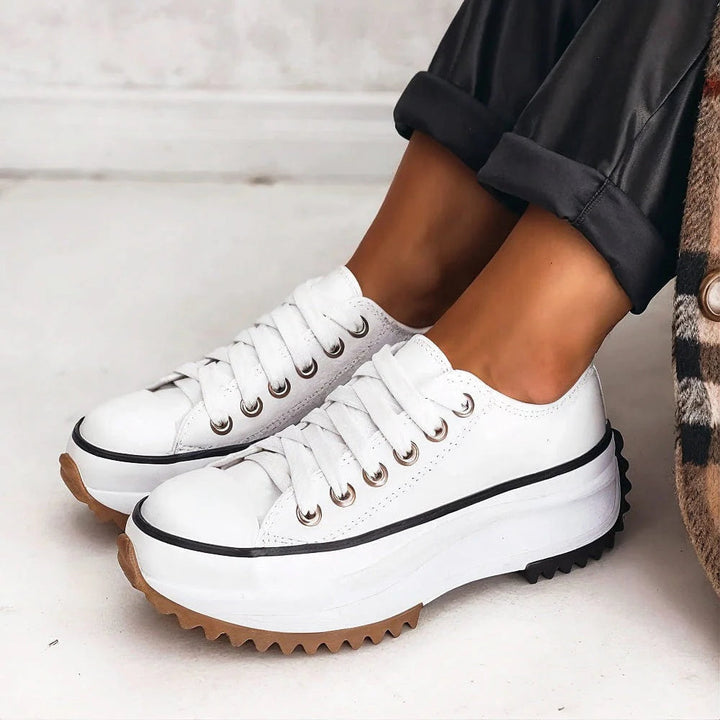 Stylish women's lace-up platform sneakers, orthopedic design for comfort. Versatile casual footwear with arch support.