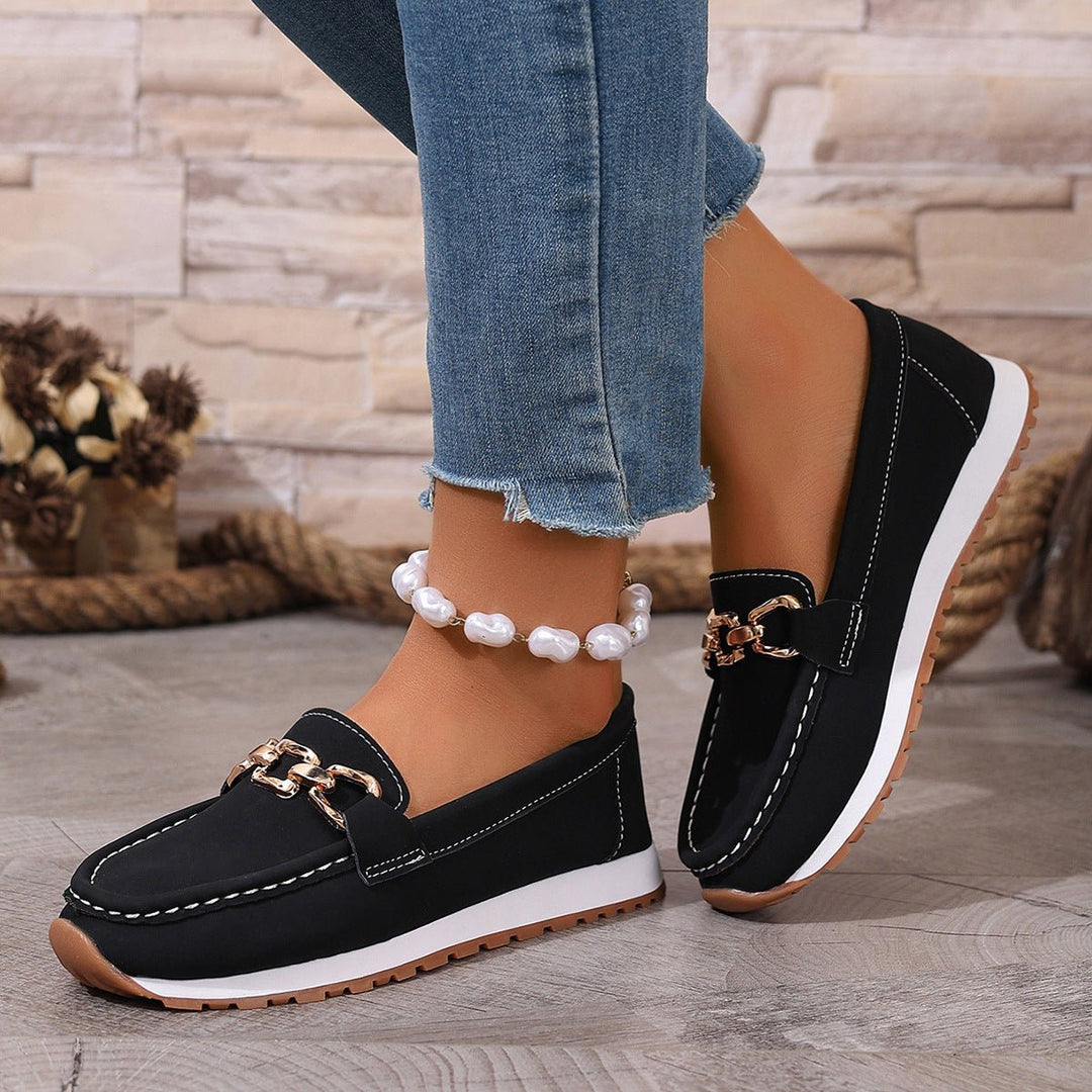 Women's supportive orthopedic slip-on loafers, providing enhanced arch support for comfortable daily wear.