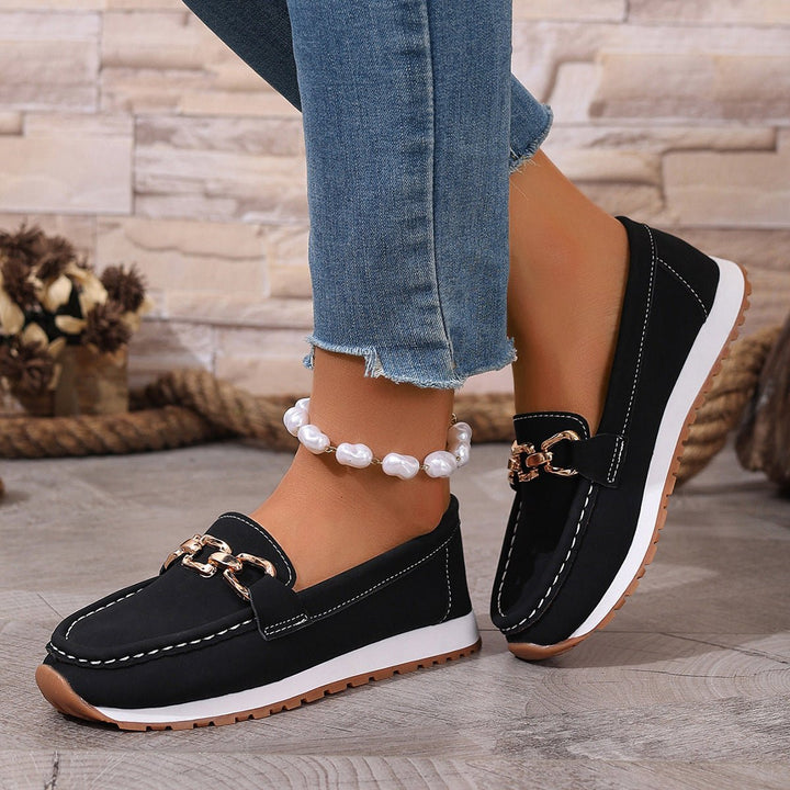Women's supportive orthopedic slip-on loafers, providing enhanced arch support for comfortable daily wear.
