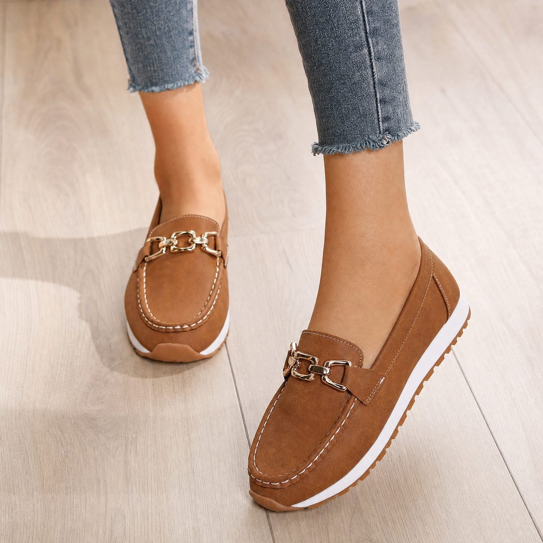 Comfortable women's orthopedic slip-on loafers, ideal for walking & daily wear, with arch support.
