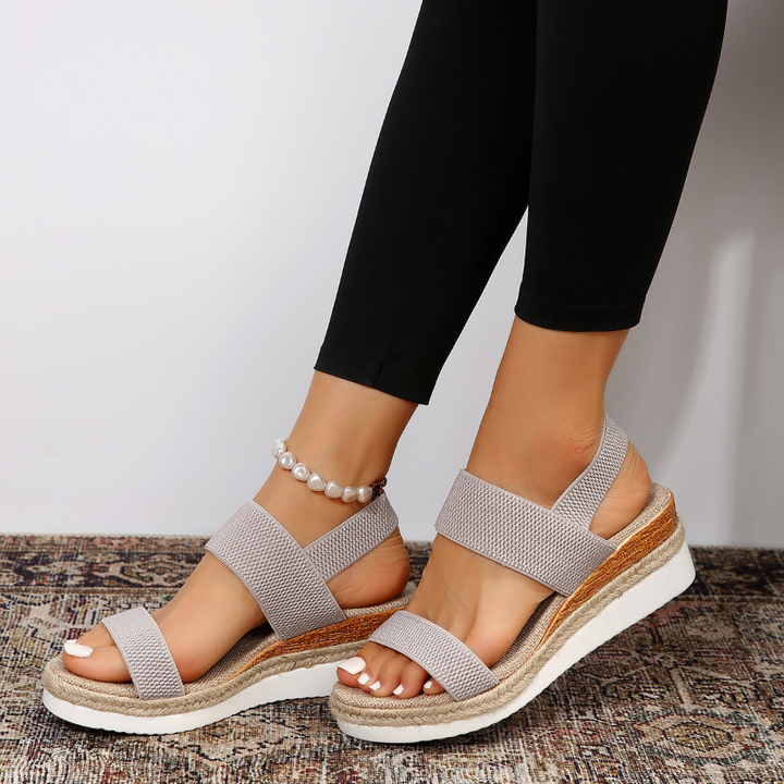Durable women's orthopedic platform sandals with non-slip sole for stability.