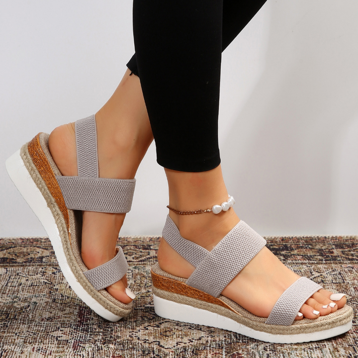 Adjustable strap women's orthopedic platform sandals for everyday wear.