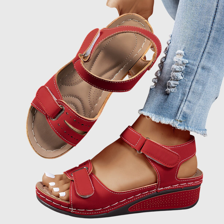 Women's orthopedic platform sandals with adjustable buckle strap, open toe comfort.