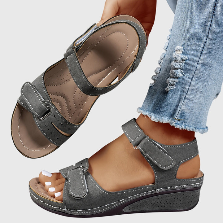 Women's comfort footwear: orthopedic platform sandals with a secure buckle closure.
