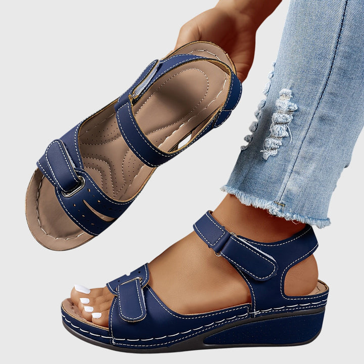 Orthopedic women's walking sandals, platform style with an adjustable buckle.