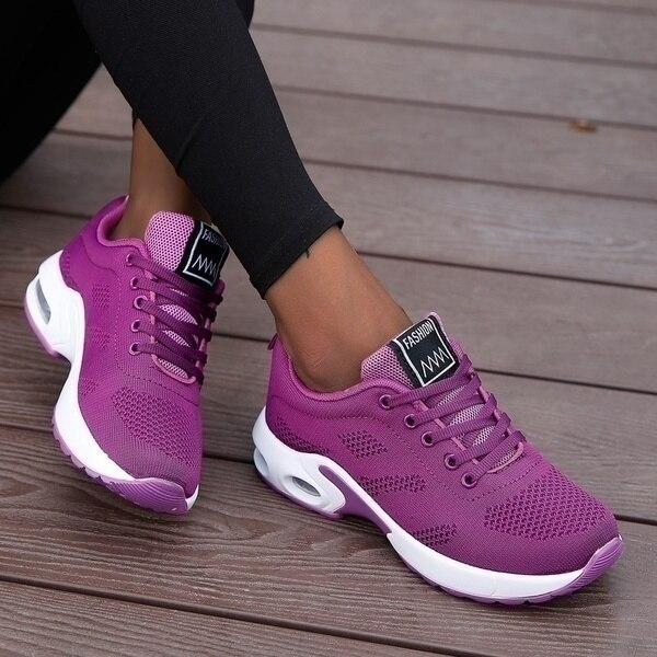 Orthopedic athletic footwear for women, offering arch support & comfort for active lifestyles.